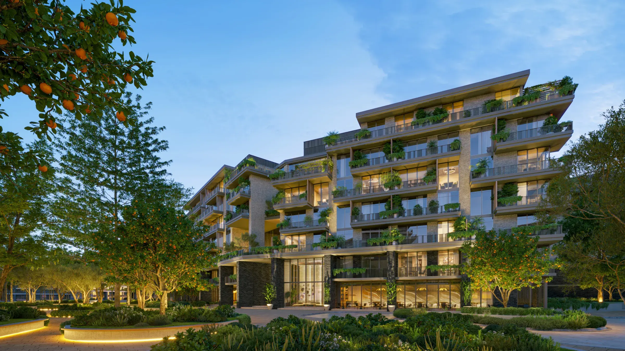 Render of an Arancia Yards building by day, with planted terraces above a glazed ground floor and orange trees in front
