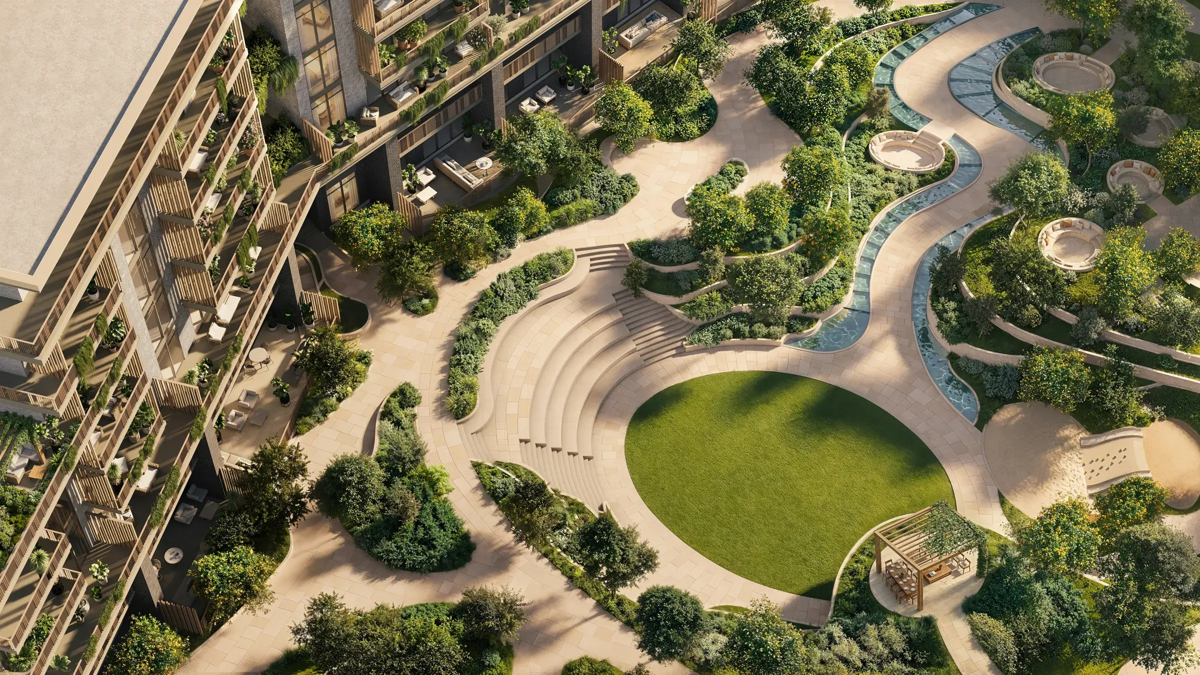 Aerial render of the sunken garden between the buildings: terraced steps down to a round lawn, a winding water channel and a pergola