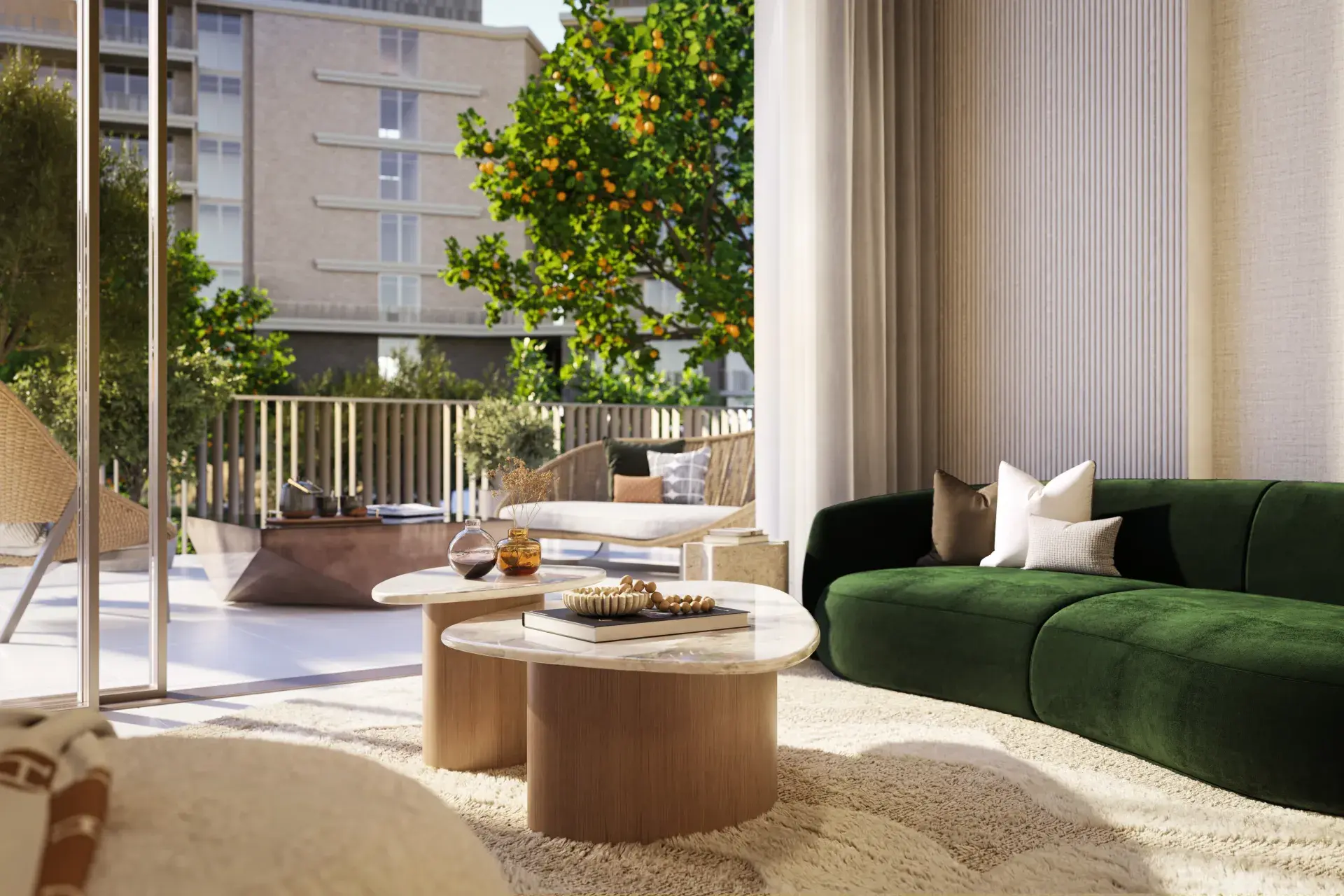 Render of a living room with a green velvet sofa, its glass doors open onto a terrace beside an orange tree