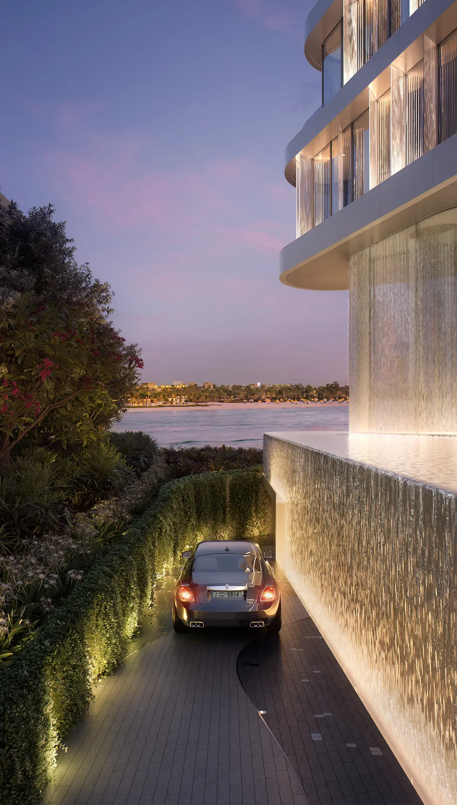 Render of a car on a lit, hedge-lined drive beside a water wall at the foot of the tower, at dusk