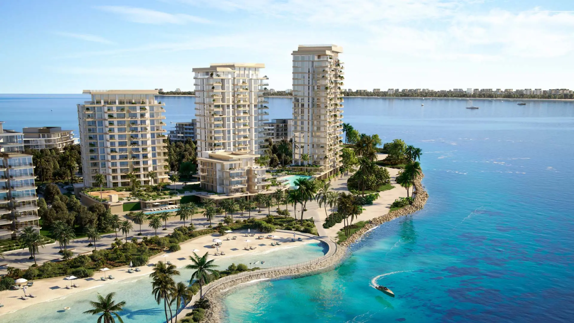 Aerial render of three residential towers and a lower block on a palm-lined point, with a beach, a lagoon and a breakwater below
