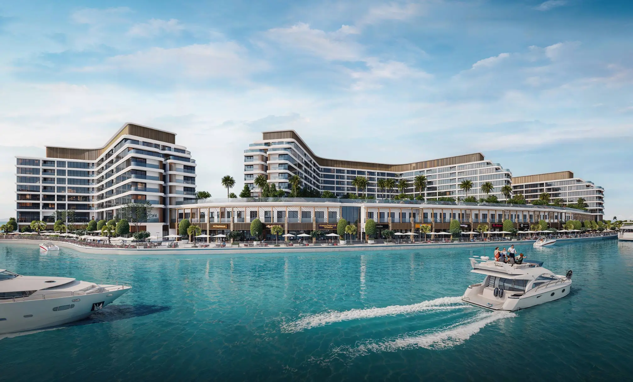 Render of three apartment blocks whose upper floors step back at the ends, above a row of shopfronts on the marina
