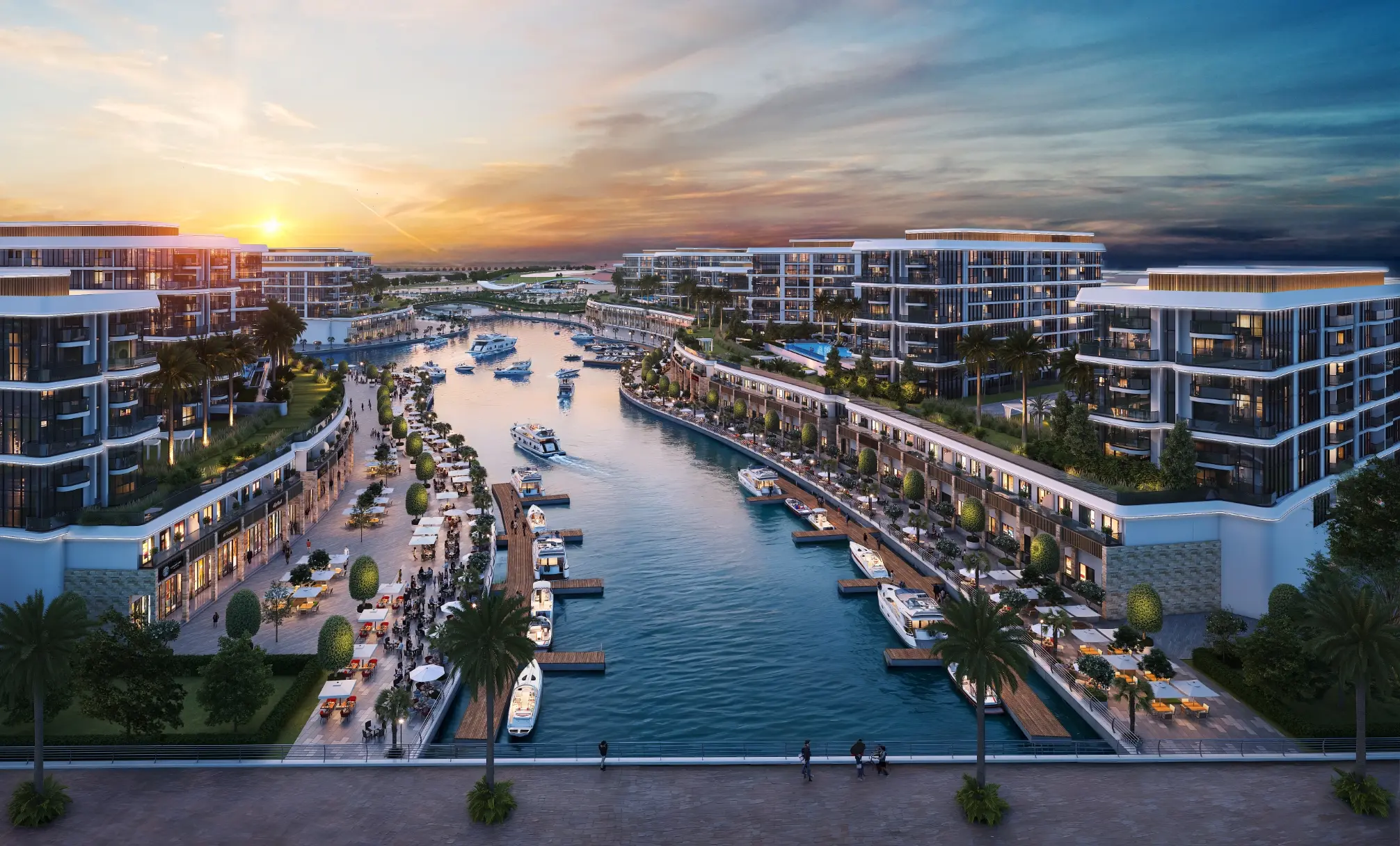 Aerial render at sunset looking down a marina canal lined with pontoon berths, café terraces and apartment blocks