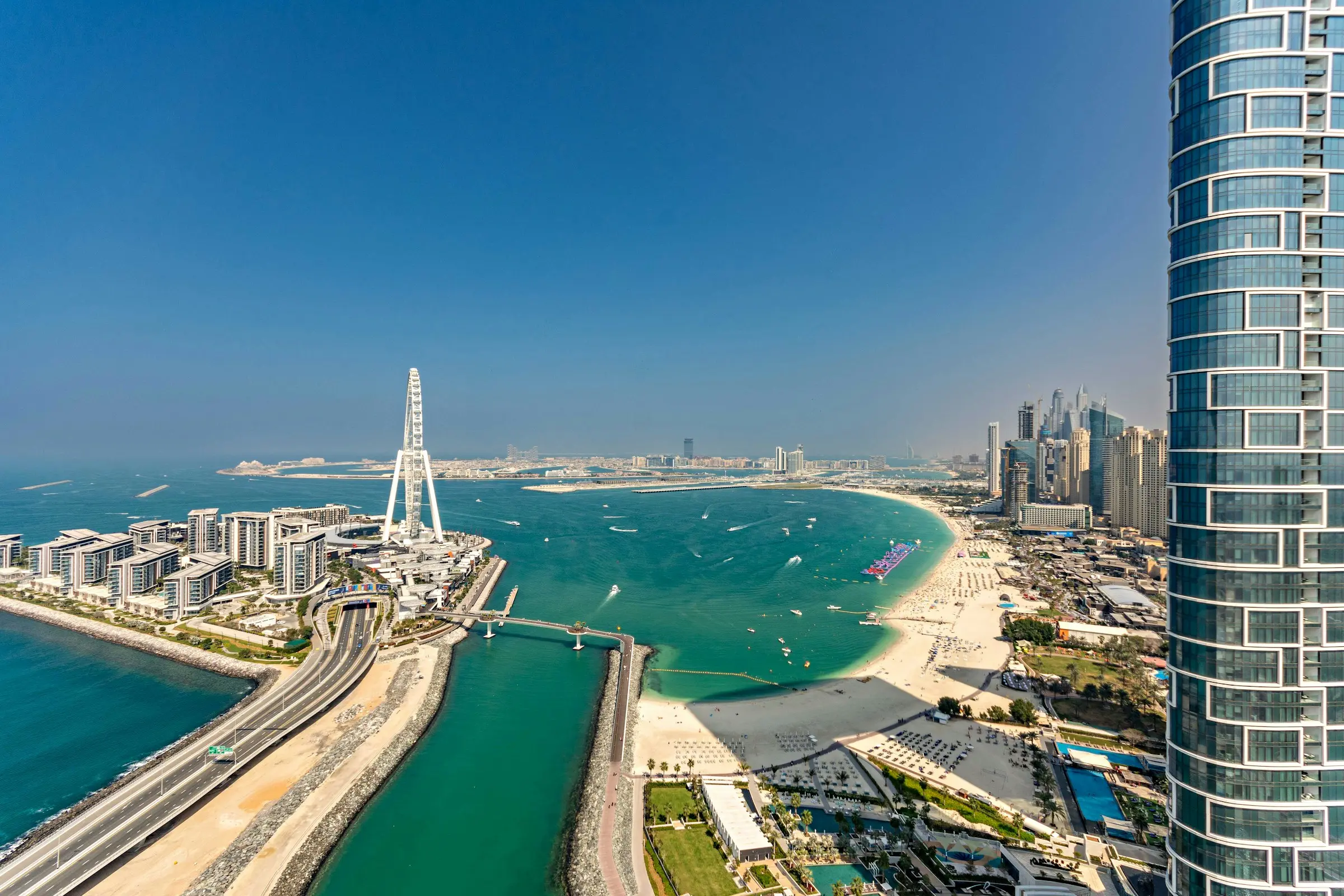 Bluewaters and Ain Dubai from the air, with the beach and towers of JBR beyond