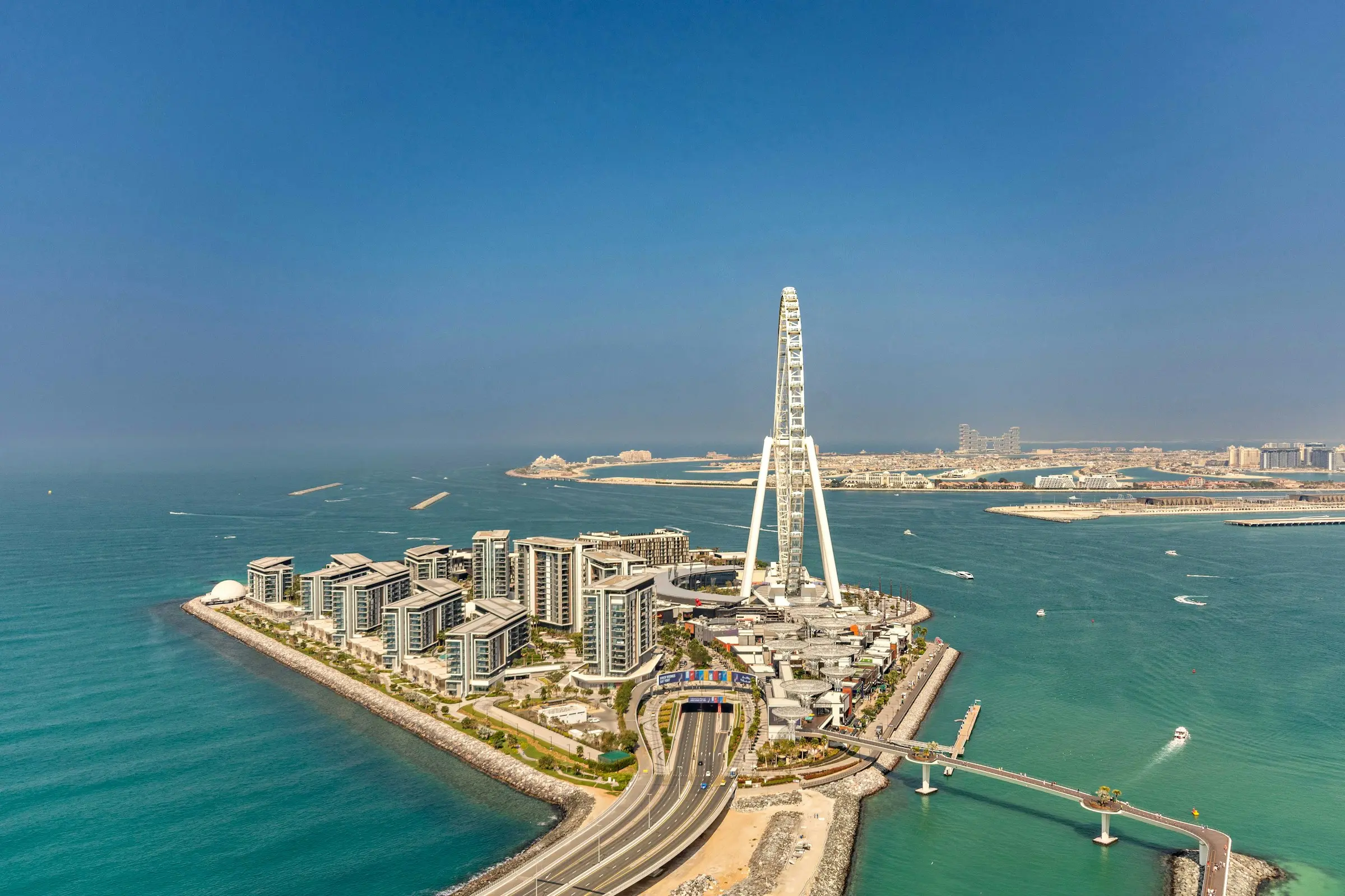Bluewaters from the air: Ain Dubai, the island's ring of buildings and the bridge to JBR