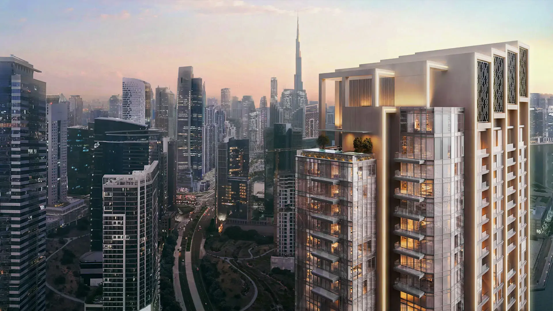 Ellington's render of One River Point's top floors at dusk, with Business Bay towers and the Burj Khalifa behind