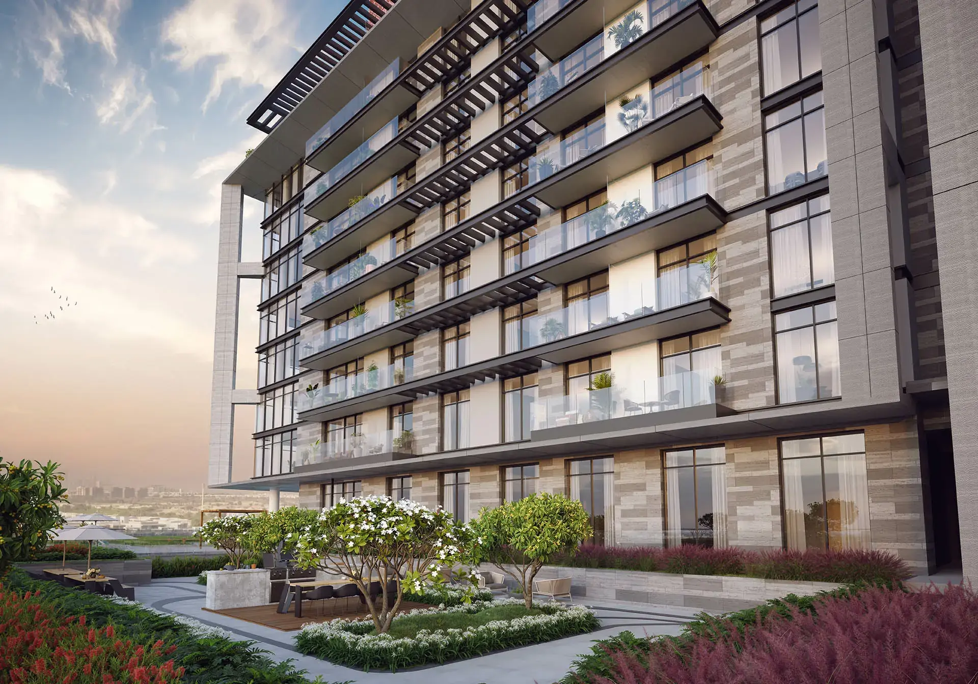 Ellington's render of Ellington House III: balconies and dark fins above a planted garden with a barbecue and dining area