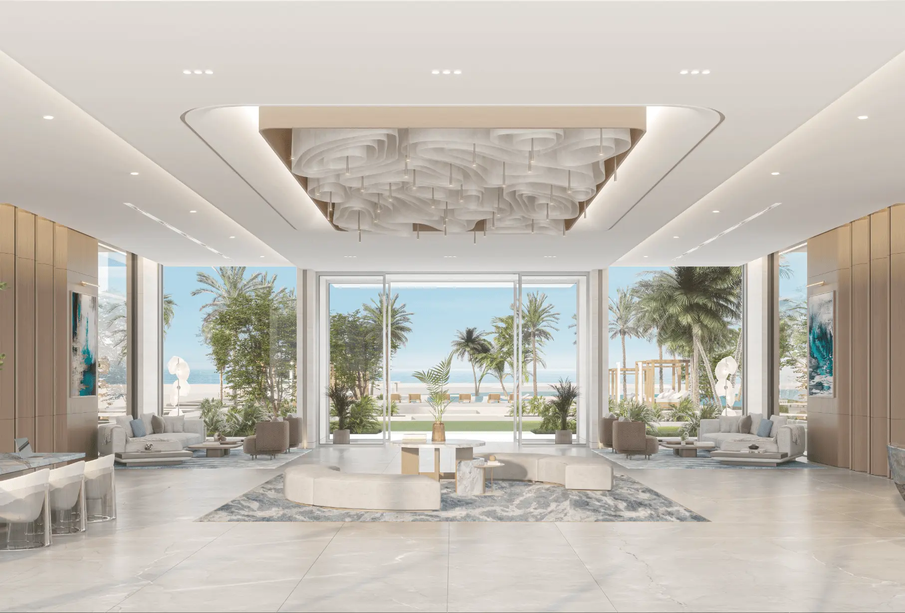 Lobby with a sculpted ceiling and full-height glass onto palm gardens