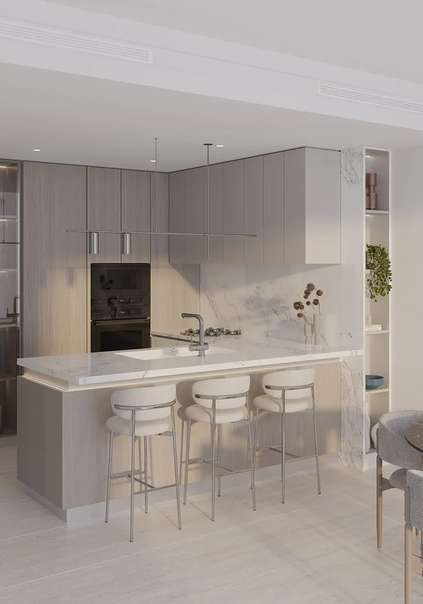 Compact kitchen with a breakfast bar, three stools and built-in ovens