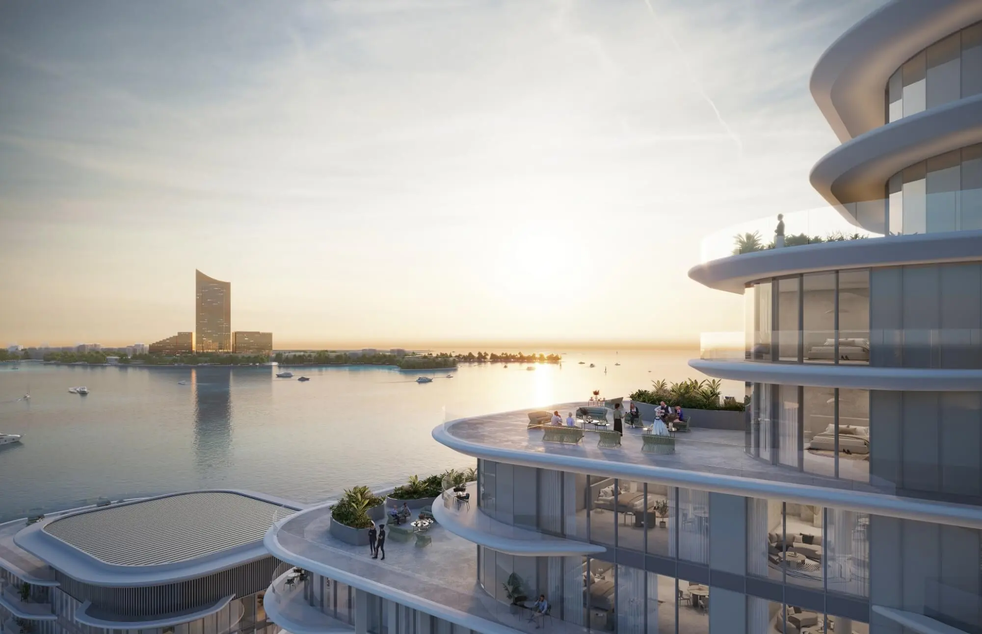 Render of a terrace with lounge seating at sunset, curved balconies rising above it and boats on the water towards a tall tower