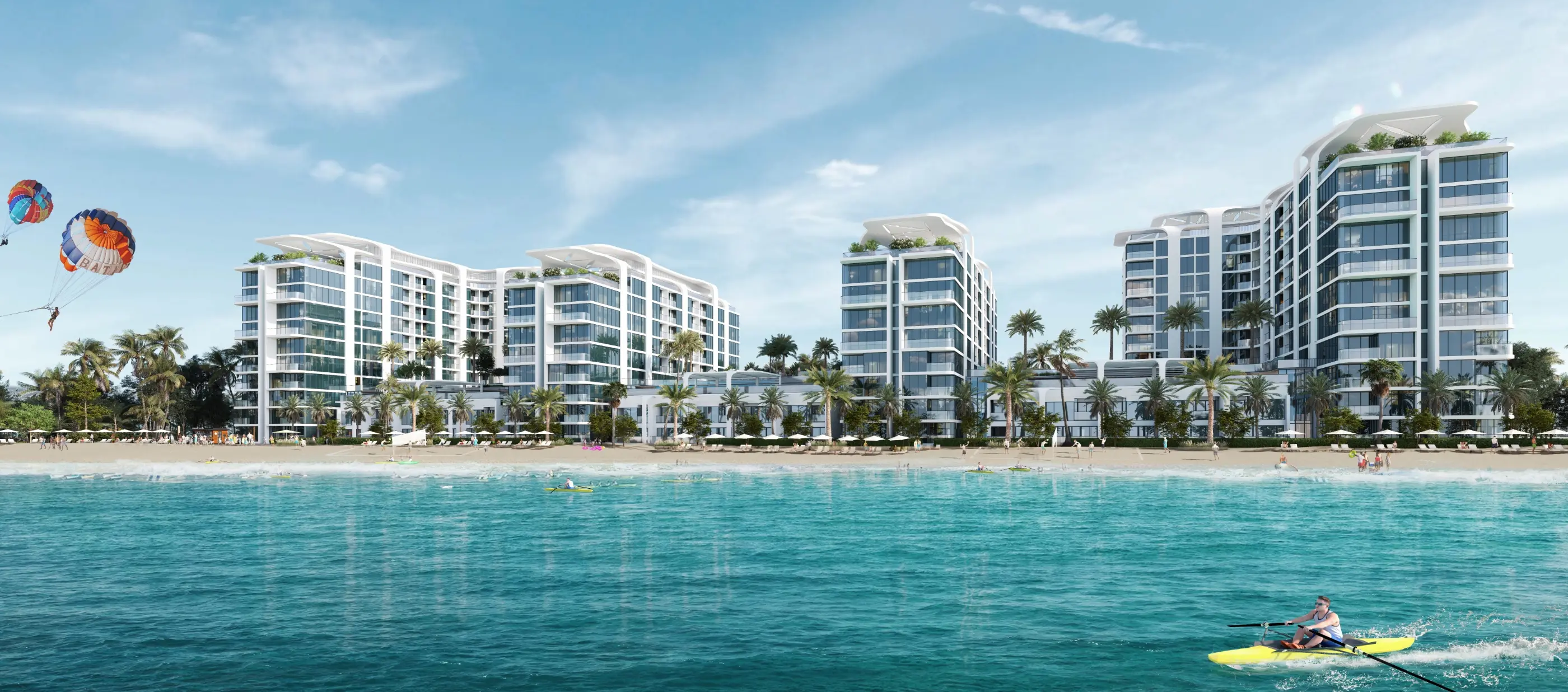 Render of Florine's white towers with curved rooftop canopies behind a palm-lined beach, seen from the water, with a rower and two parasails