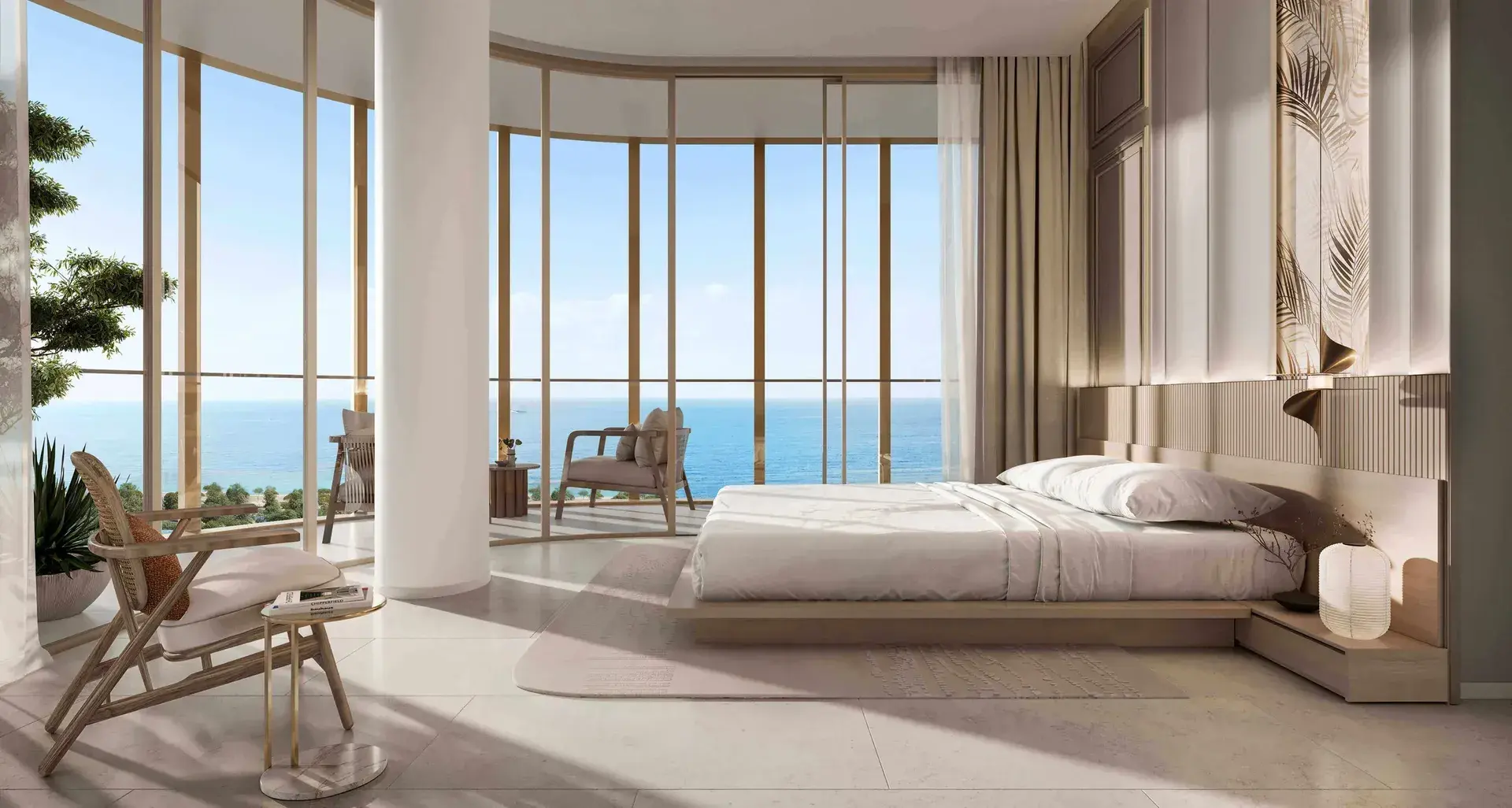 Render of a bedroom with curved floor-to-ceiling glass onto the sea, a round column and a lounge chair