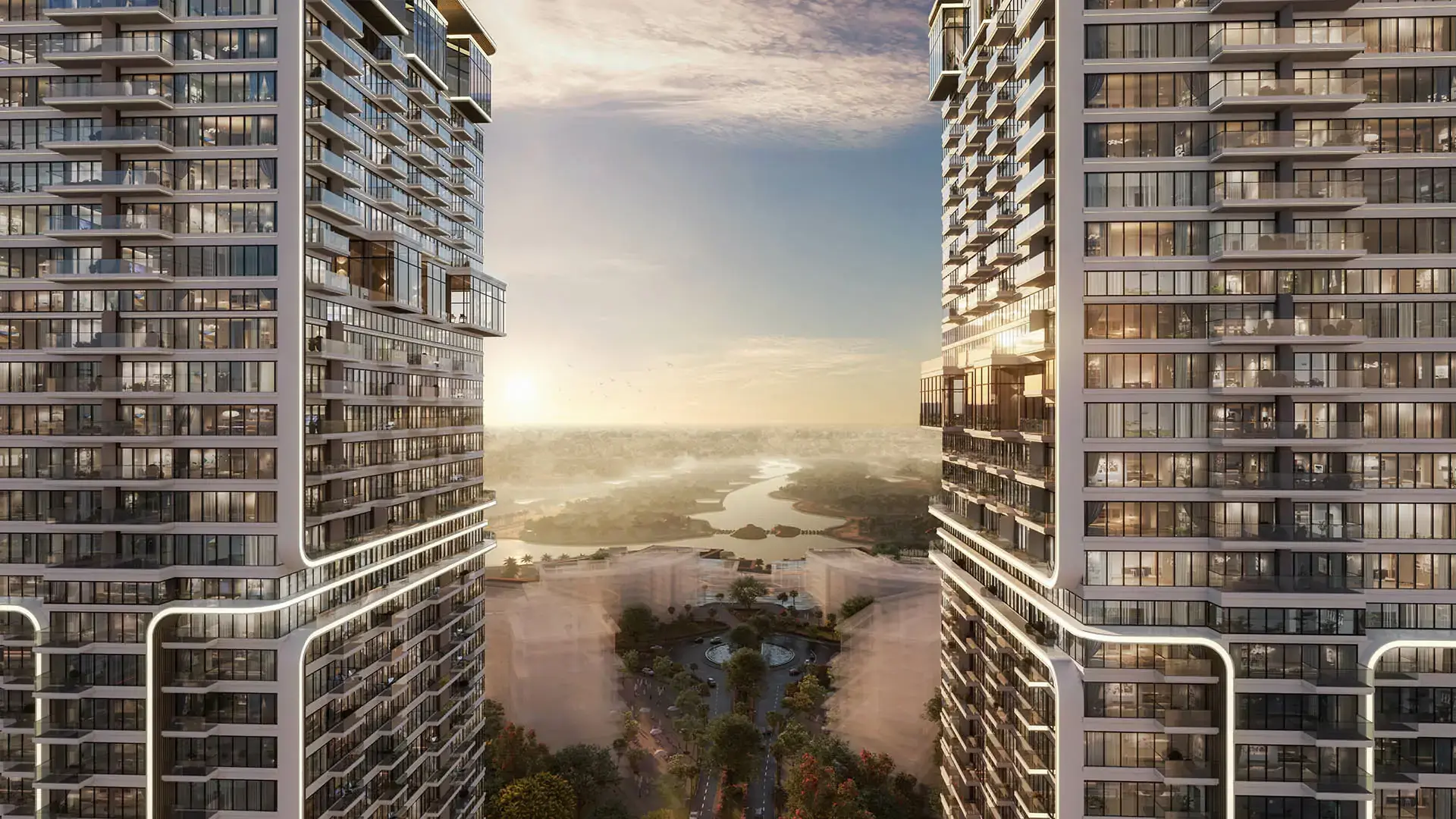 Ellington's render of the two UH by Ellington towers in JLT, framing a view over a lake and villa communities at sunset