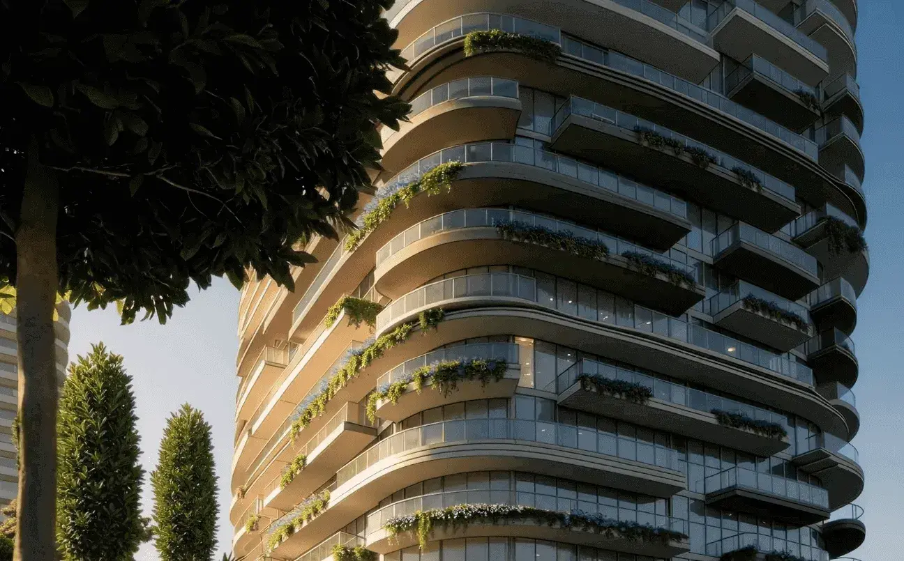 Render looking up at curved balconies with built-in planters, framed by cypress trees