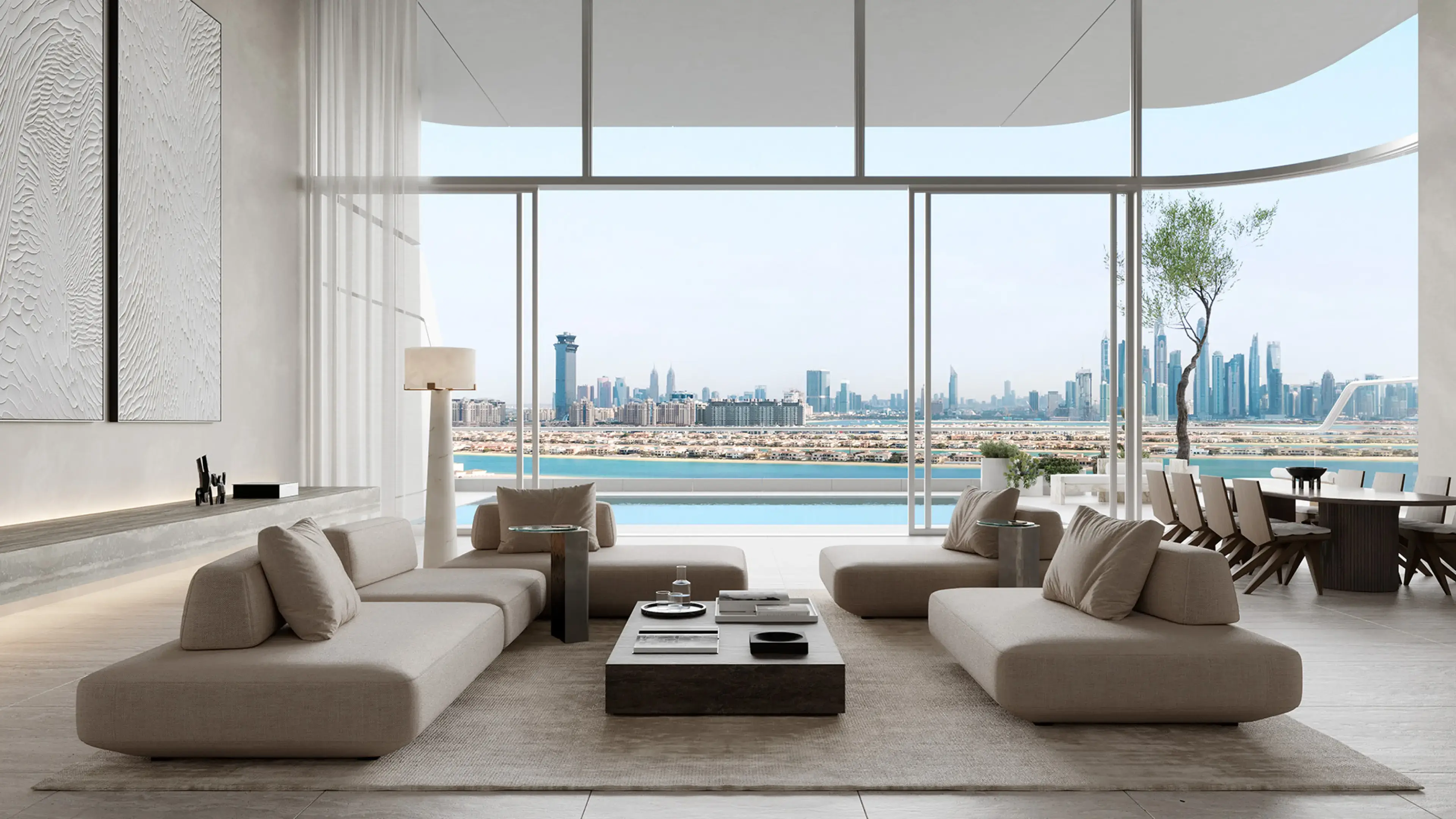 Render of a living room with low sofas and full-height glass sliding open to a terrace pool, the Palm and the city skyline beyond