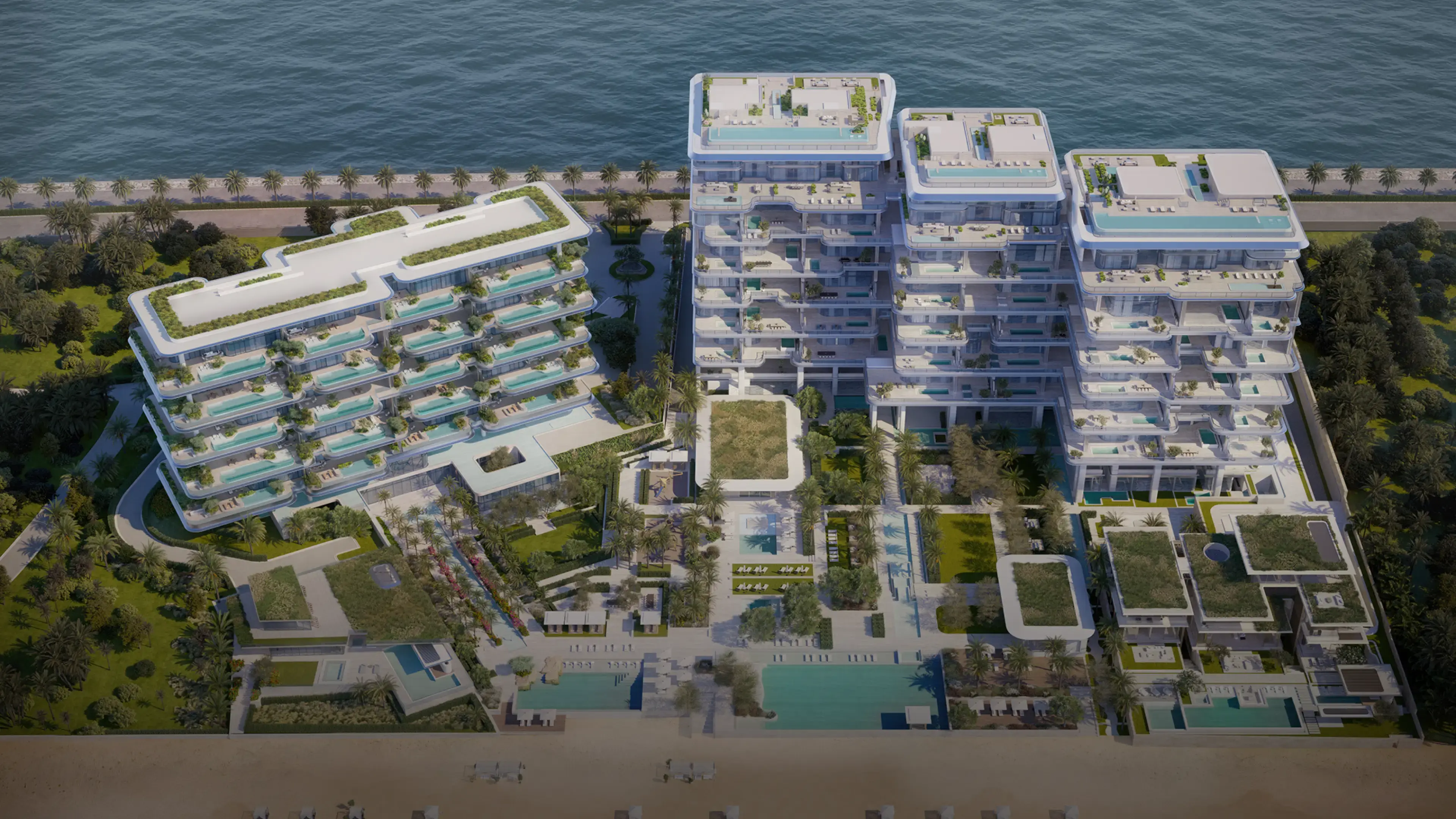 Aerial render of the shared site: Orla Infinity's lower block on the left, Orla's three linked towers on the right, gardens and pools running to the beach