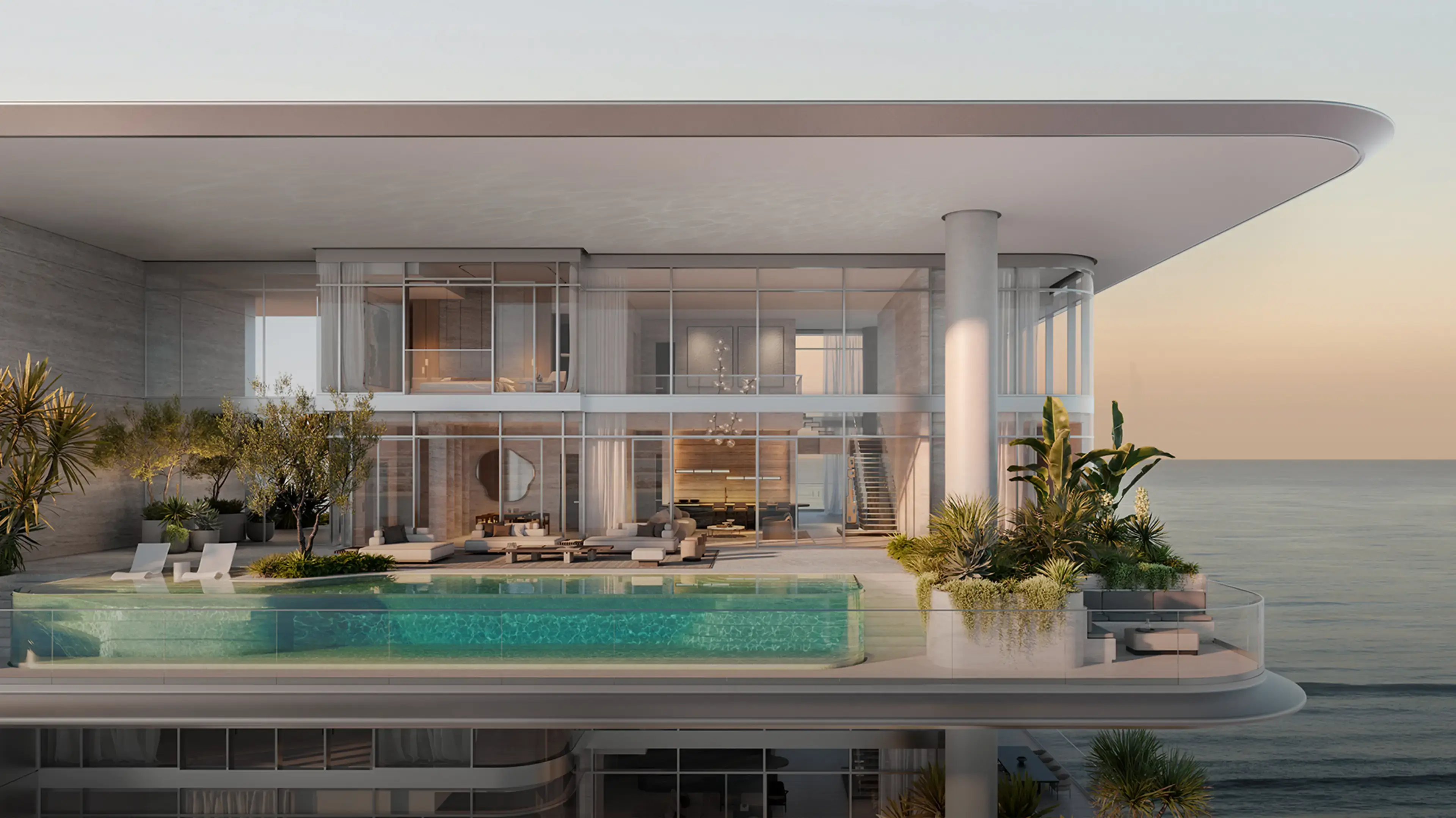 Render of a duplex terrace at sunset, with a long glass-sided pool and planting in front of a two-storey glass facade, the sea beyond