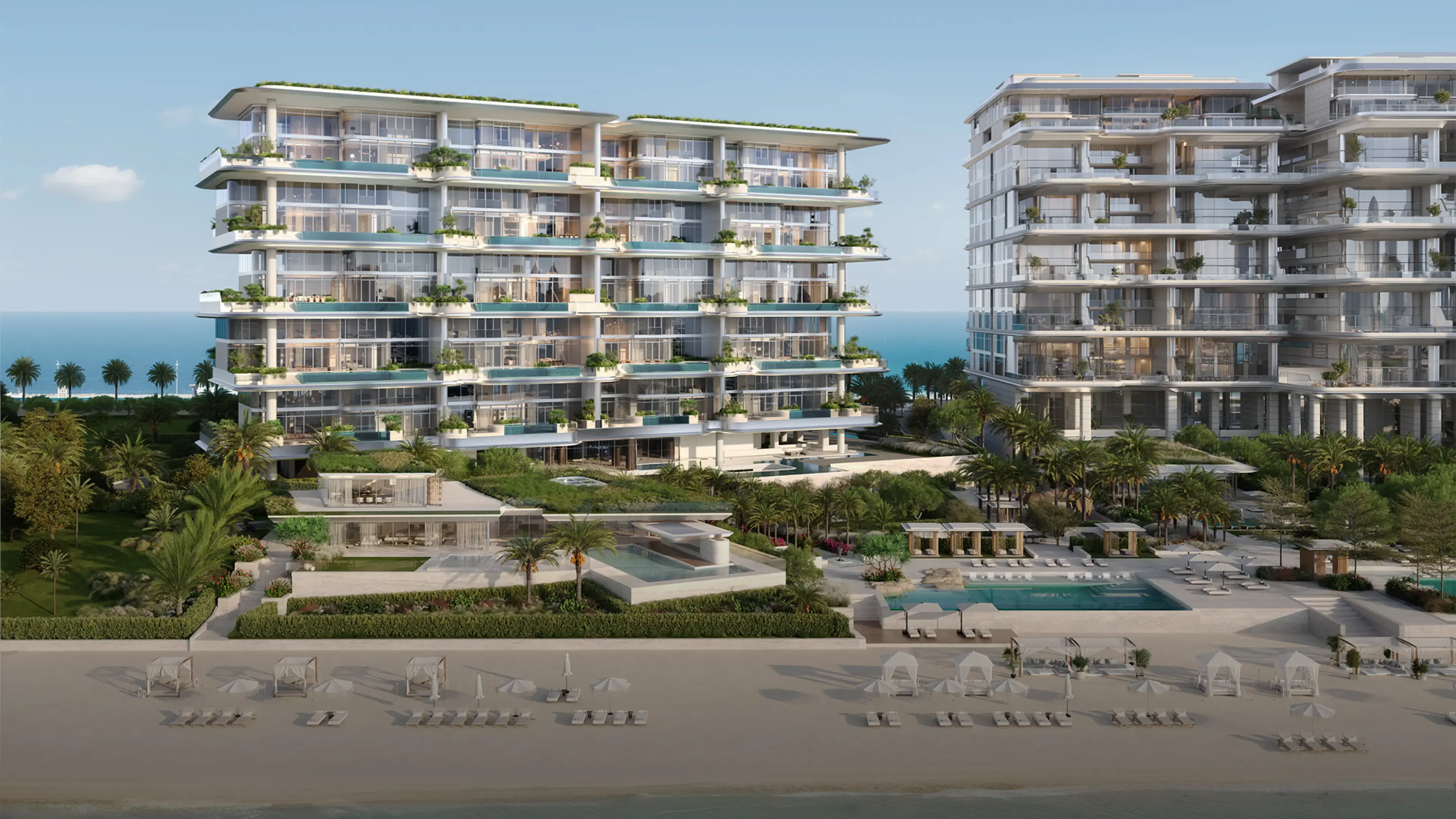 Render from the beach of Orla Infinity, left, and Orla, right, with cabanas and loungers on the sand and a pool behind