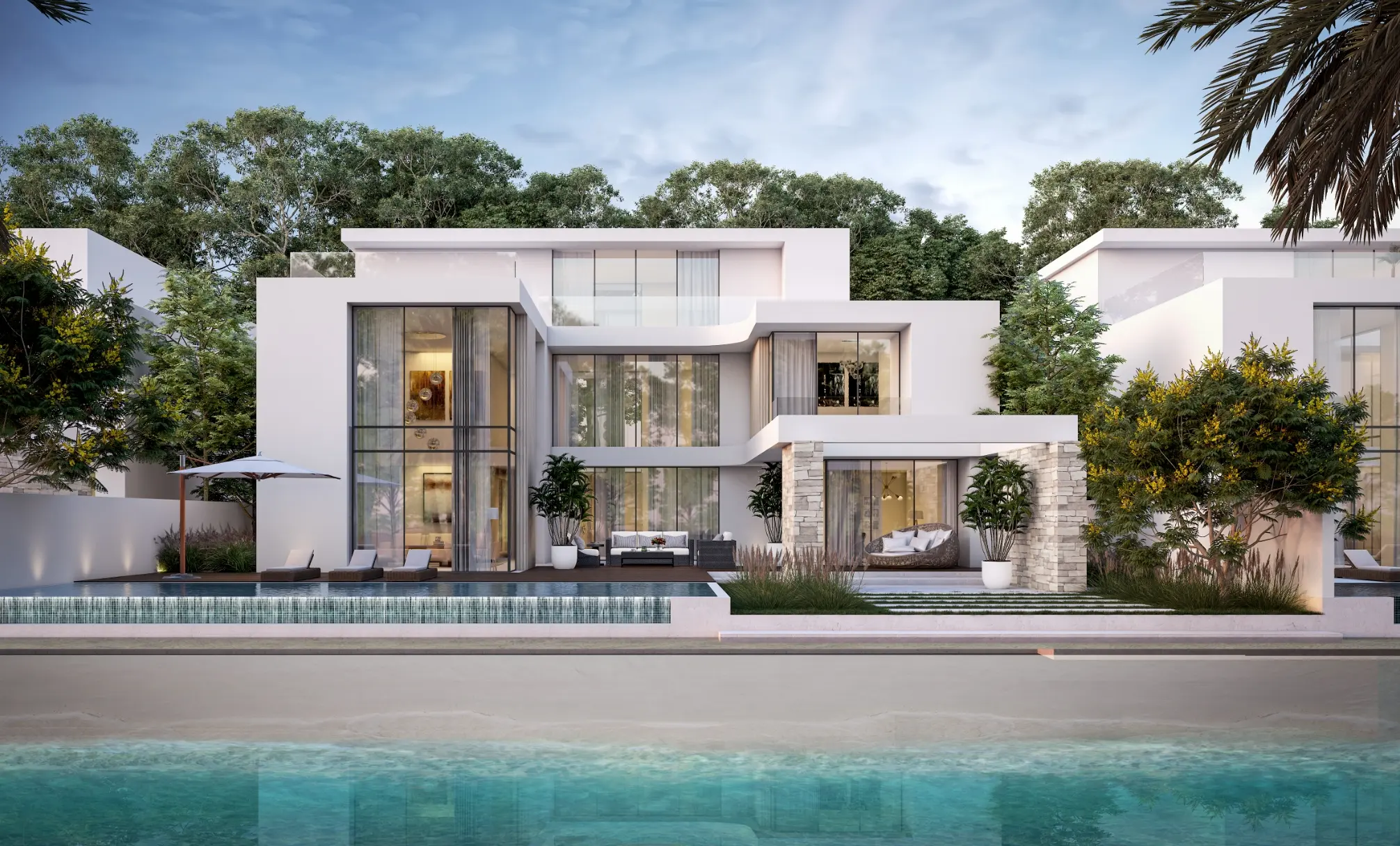 Render of a white villa seen from the water, with tall glazing, sun loungers and an infinity-edge pool above the sand