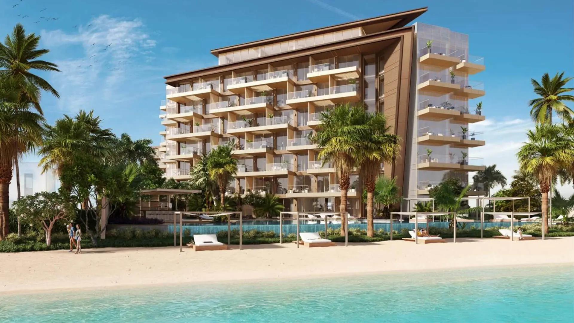 Ellington's render of Ellington Beach House on Palm Jumeirah: an angled-roof apartment building above a pool and a beach with loungers