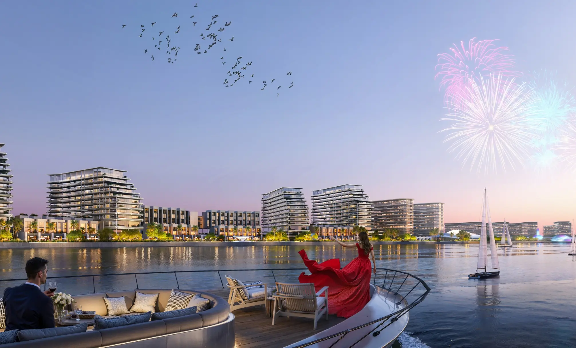 Sobha's render of the Sobha City waterfront at dusk: mid-rise towers and low-rise blocks along the water, seen from the deck of a yacht