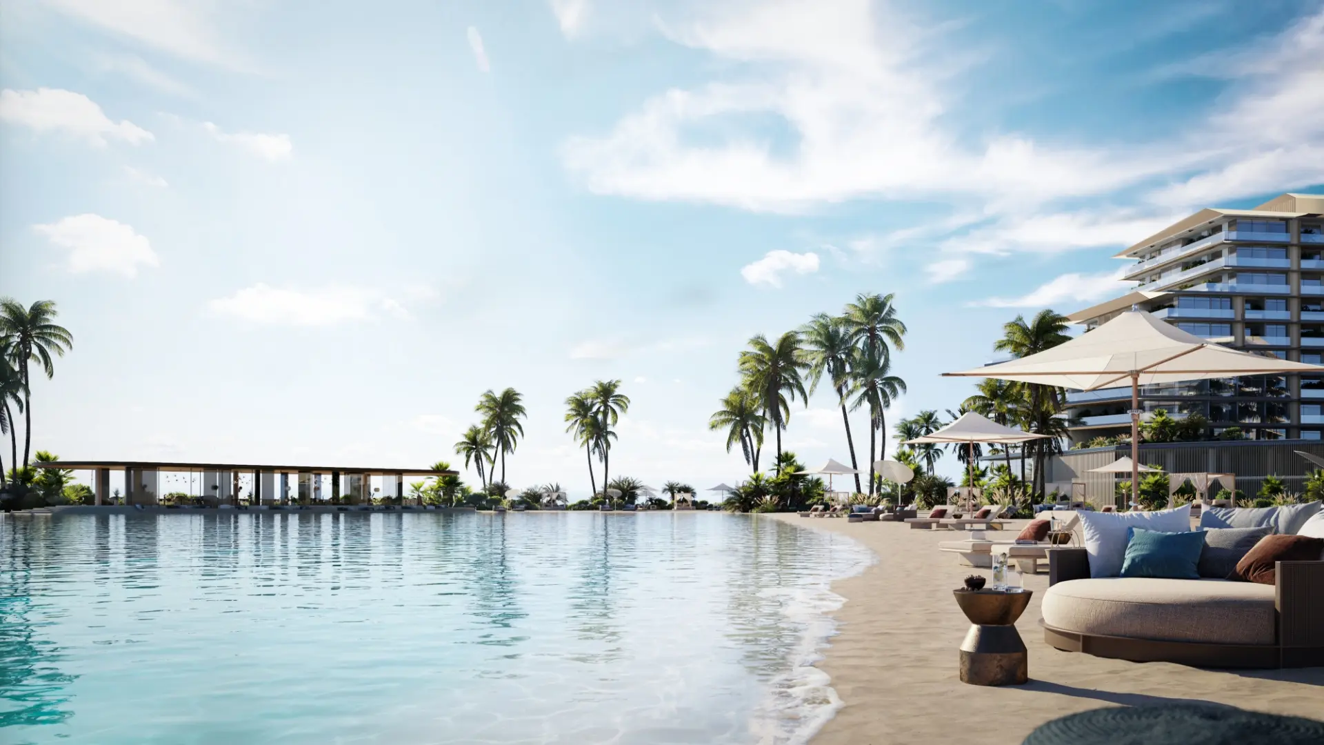 Render of a sheltered, curving beach with a round day bed and parasols, a long pavilion by the water and a building at right
