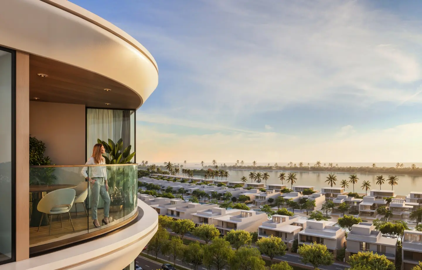 Render of a woman on a curved balcony at sunset, looking over villa rooftops and palms to the water