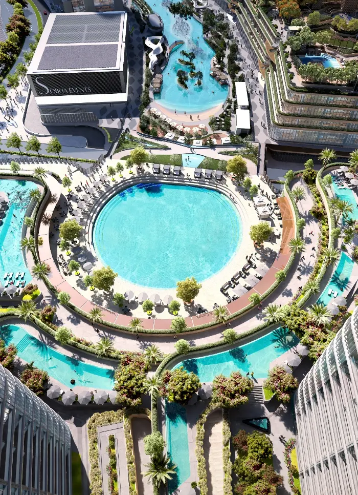Aerial render of the podium's round pool ringed by loungers, with curving pools below and the Sobha Events building above