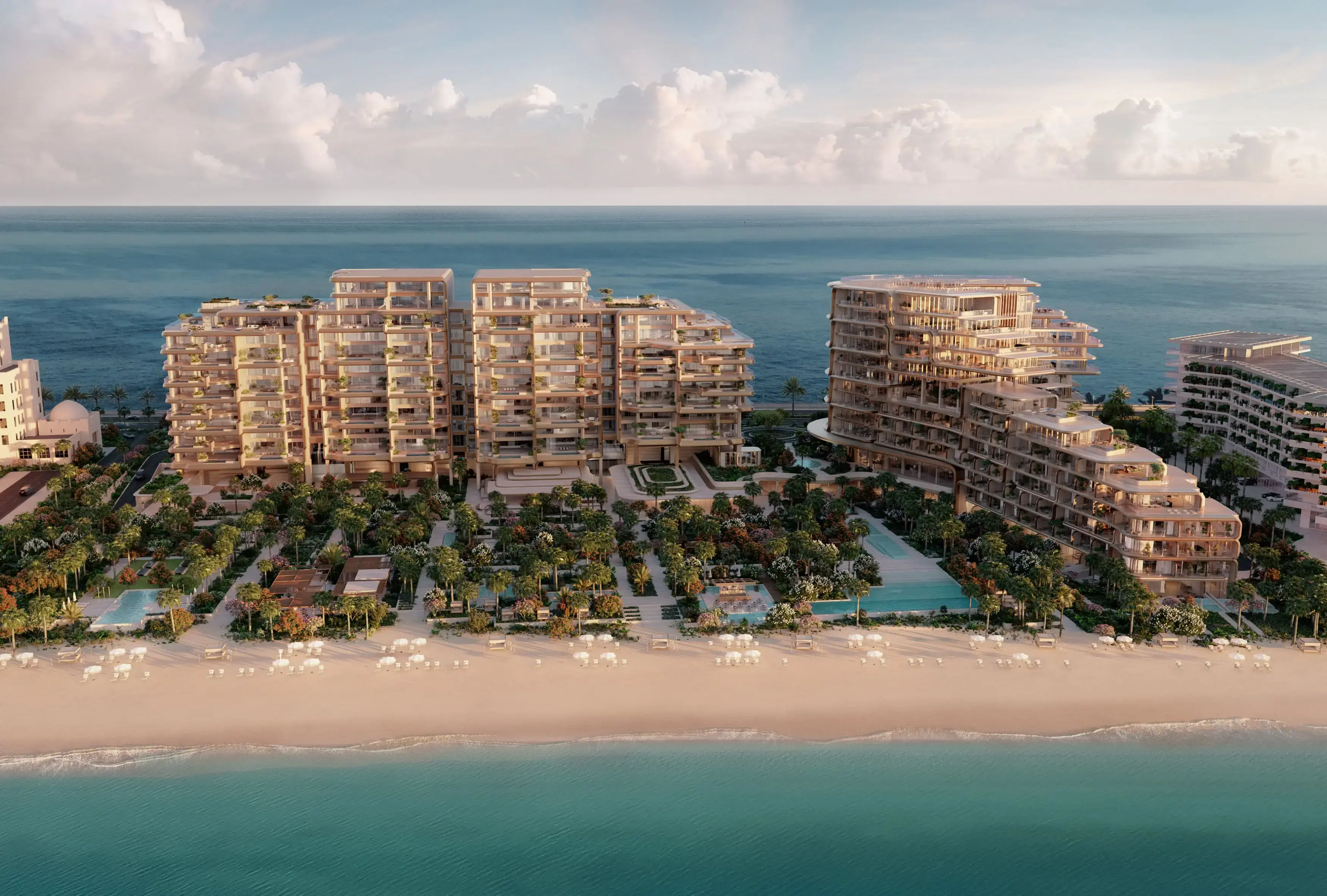 Aerial render of The Alba on Palm Jumeirah: two groups of terraced buildings behind gardens, pools and a private beach