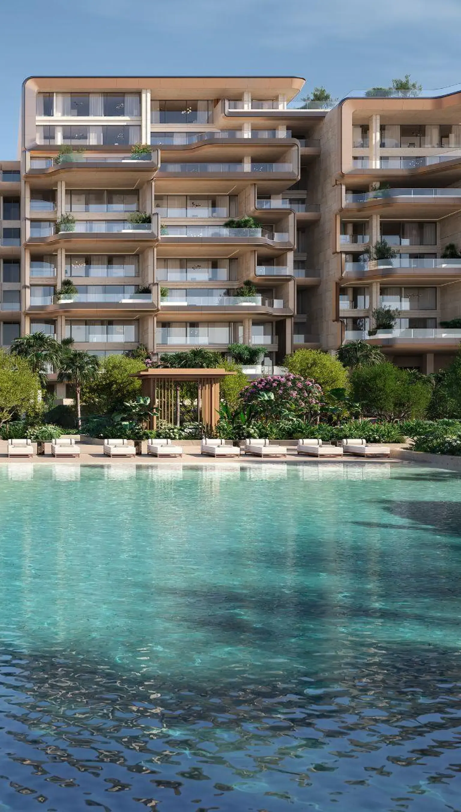 Render of a terraced building behind a pool, with a timber pavilion and a row of loungers at the water's edge