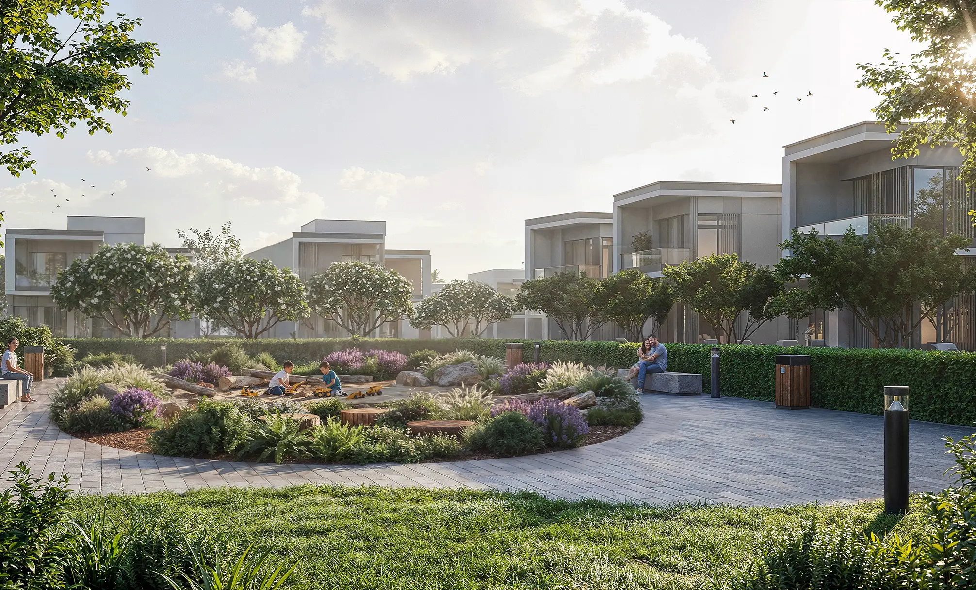 Render of a paved garden with planting beds and a children's play area, villas behind a hedge
