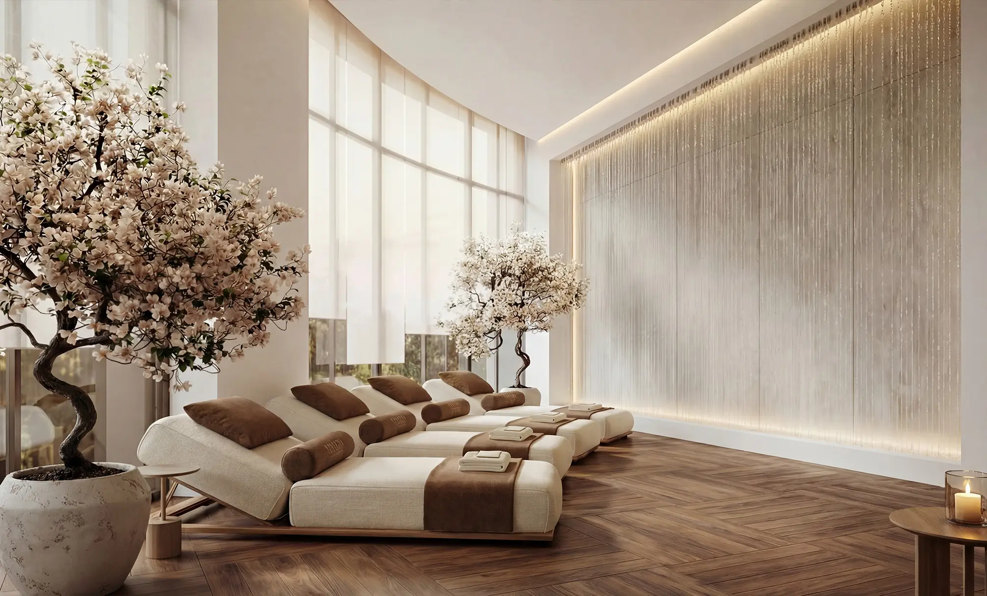 Render of a relaxation room with padded loungers, blossom trees and a lit textured wall