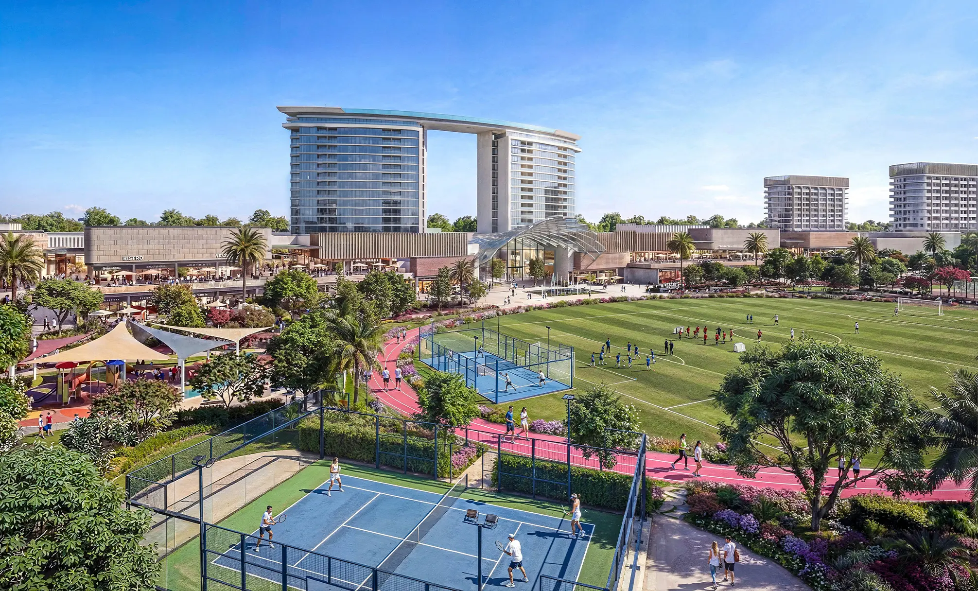 Aerial render of a football pitch, padel and tennis courts and a running track, with shops and towers behind