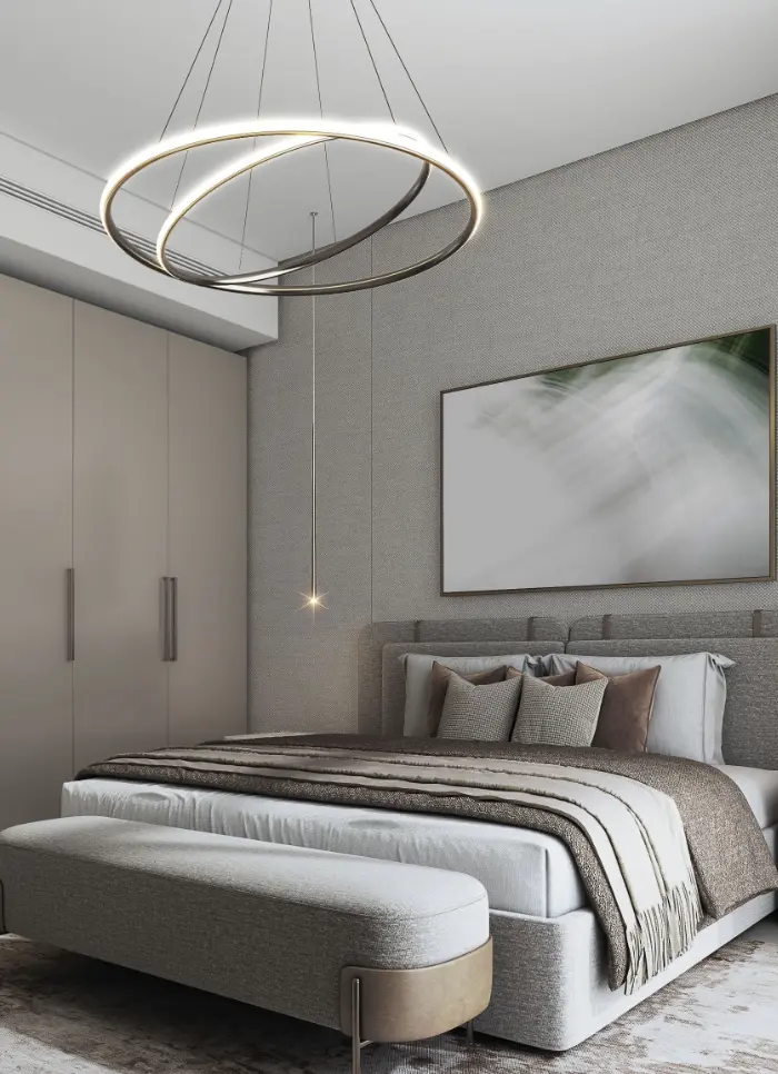 Render of a bedroom with a grey upholstered bed, a ring pendant light and a wall of fitted wardrobes