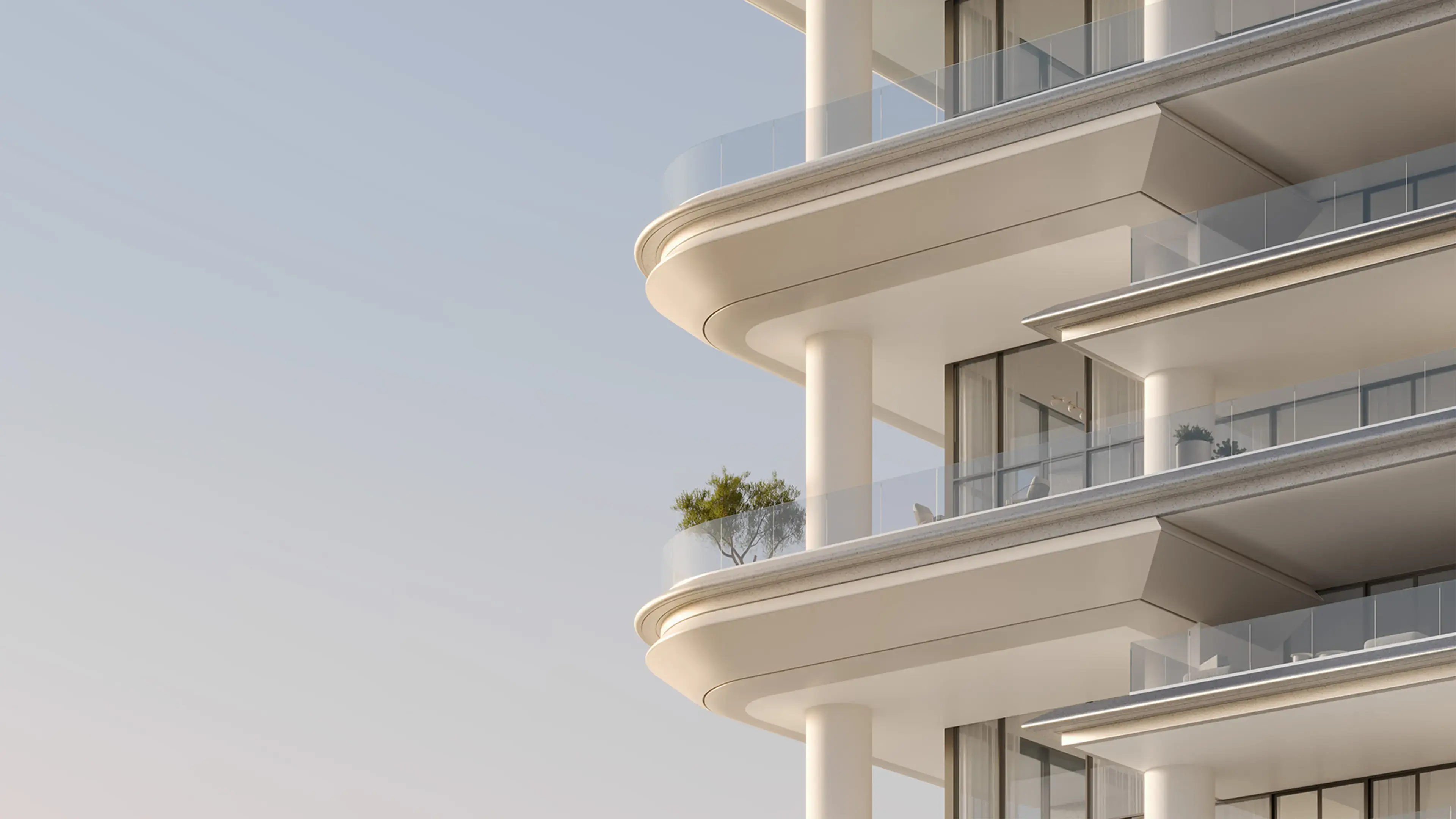 Render of Vela's facade up close: rounded white balconies with glass rails, one floor above another