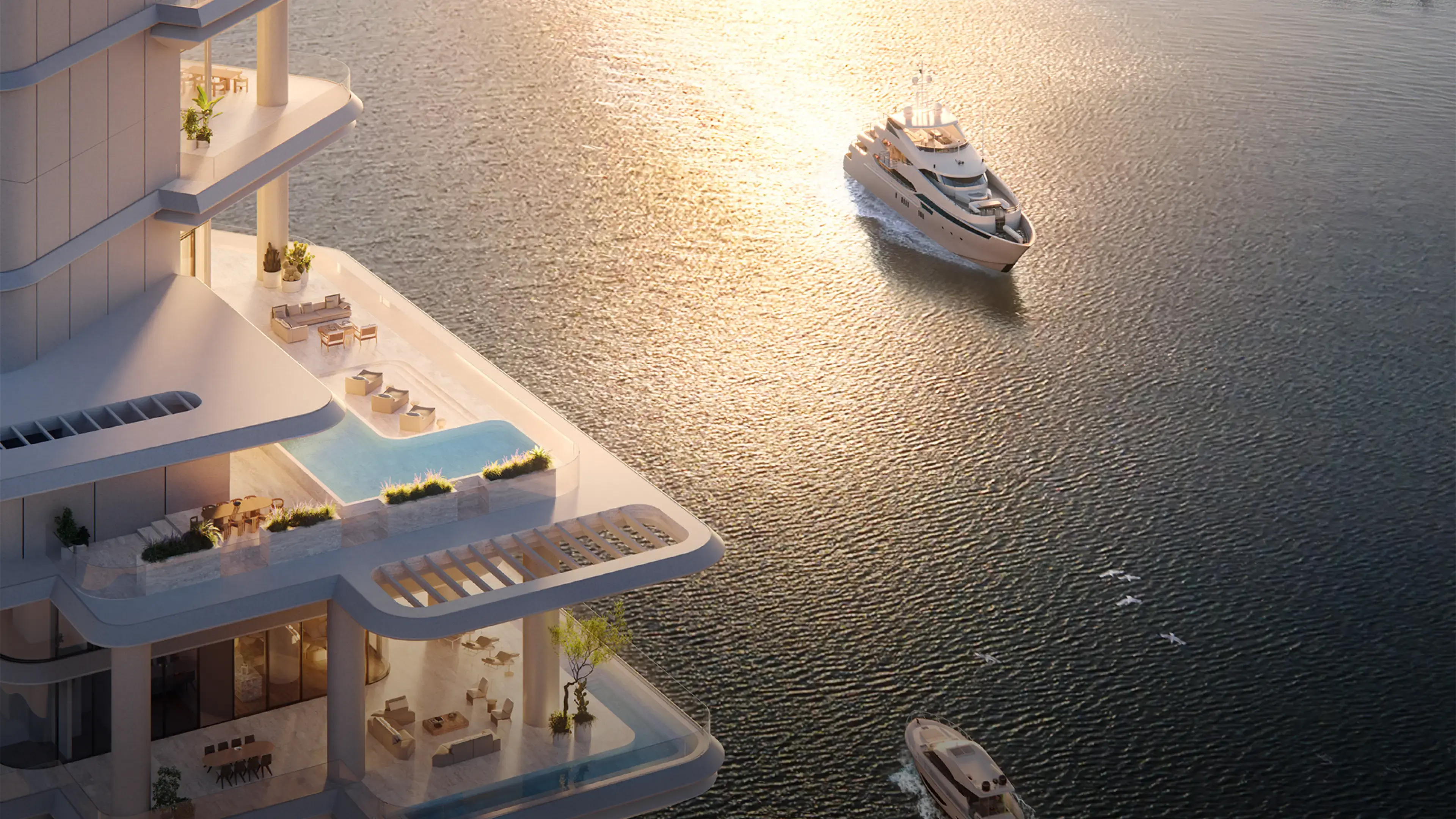 Aerial render of a terrace with an L-shaped pool and lounge seating over the water, a yacht passing below